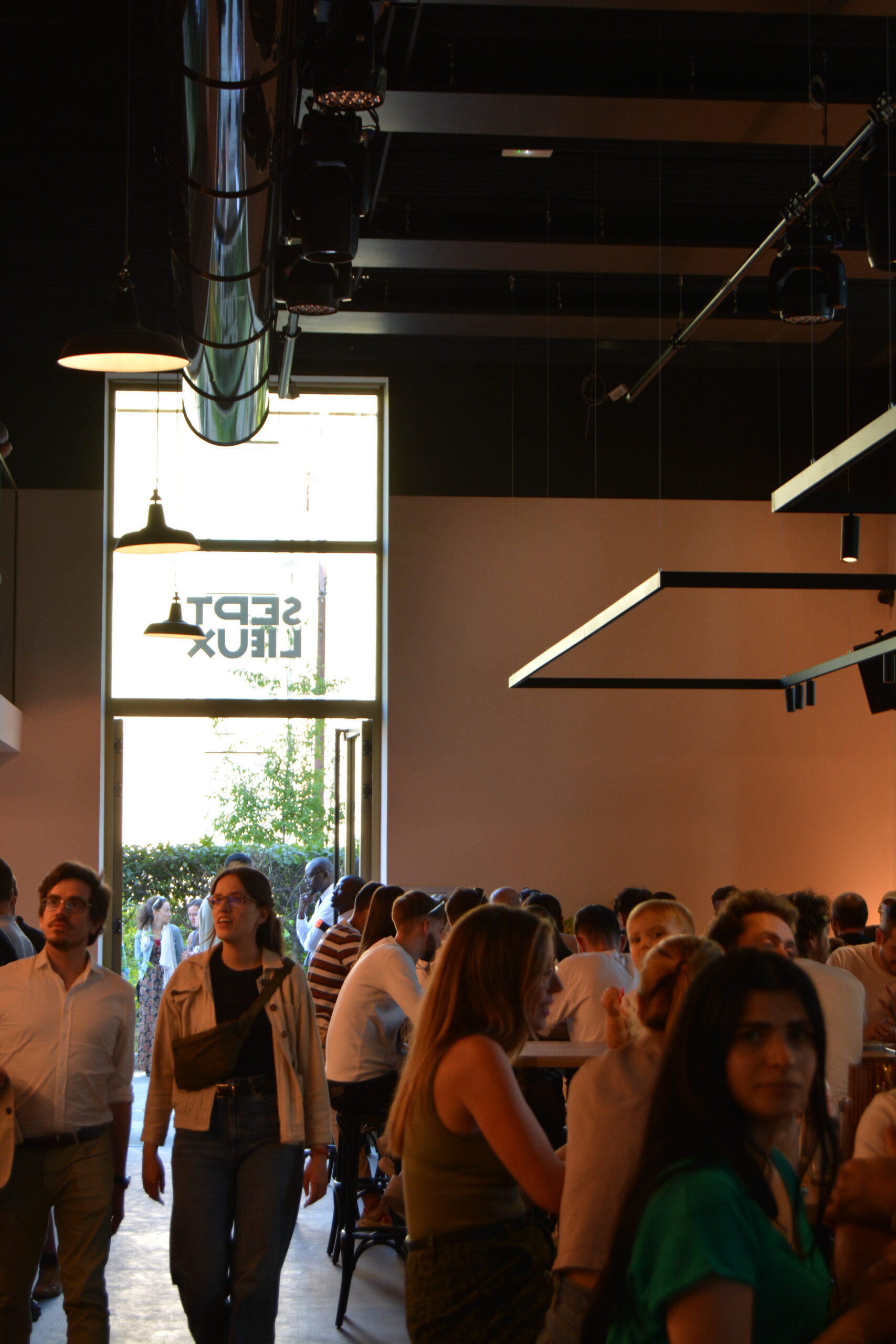 image showing the interior of the seven-location food court with several customers inside